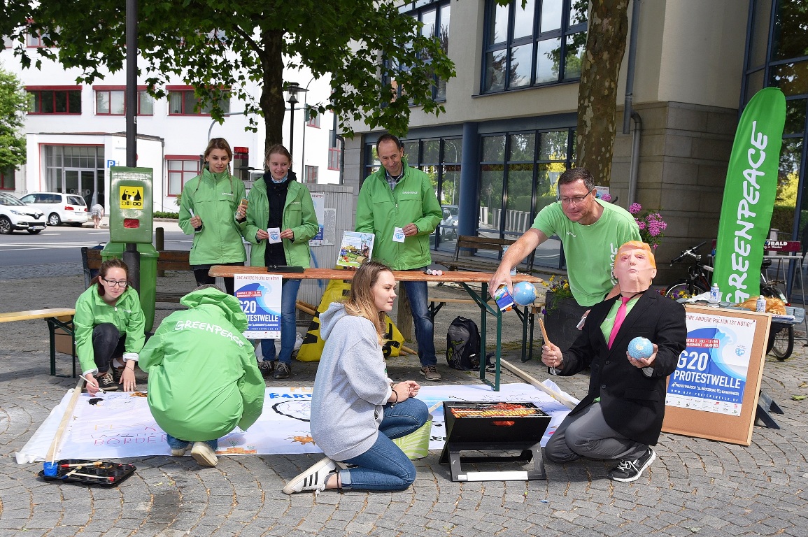 Greenpeace : öffentliches Bannermalen für die G20 Protestwelle