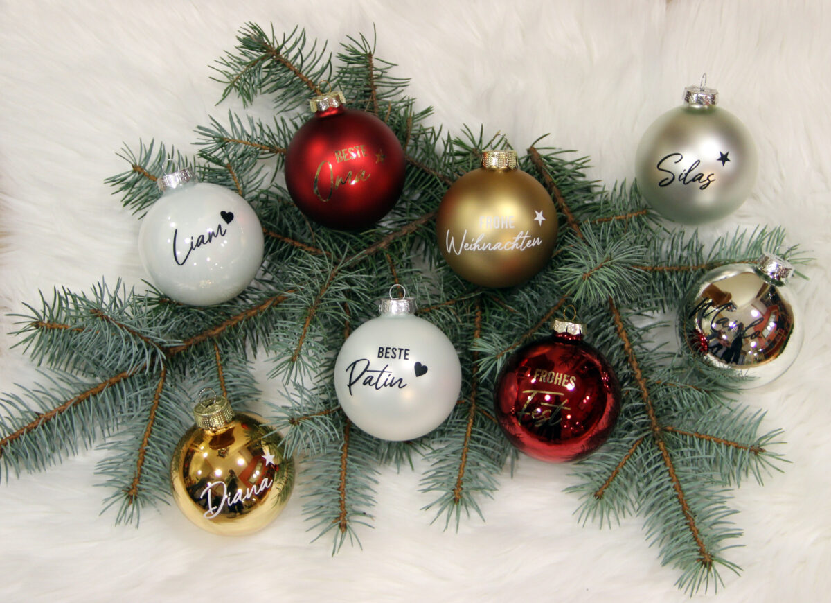 Kindern einen Wunsch erfüllen: Einzigartige Christbaumkugeln mit Beschriftung