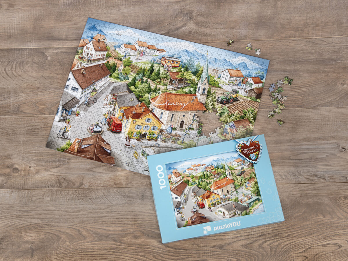 Gewinnspiel & Geschenkidee: „Dahoam is Dahoam in Lansing“ jetzt als Puzzle